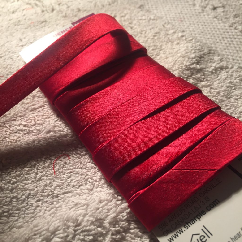 red silk corset binding 
